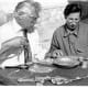 Archaeologist Viktor Sarianidi (left) and Terkesh Khodzhanyanov inspecting gold objects excavated from Tillya Tepe, Tomb IV, 1978 - © Viktor Saranidi, National Museum of Afghanistan / Musée Guimet