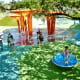 Looking down into children’s play area from elevated boardwalk