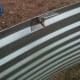 The angle of the clips is designed to match and support the roof sheets.