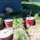 Three barrels are checked in different directions for accuracy of placement.
