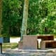 One of many picnic areas in a more wooded section of the park.