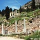 Roman Agora on the lower levels of the Sacred Way. Columns of Temple of Apollo in the distance above.