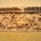 More of the North Frieze of the Siphnian Treasury. The goddess Cybele attacks from a chariot drawn by lions! Artemis and Apollo are in front of her.