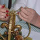 Step 2: If you will be adding an ornament, tie to top joint of mobile or glue.