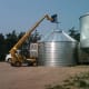 The bin was secured out of the way. Next day, we finished the 5th ring on this bin, then built the first ring and roof of a second bin. After that, wind won again.