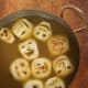 Jack O' Lanterns carved from Granny Smith Apples And Made Into A Delicious Apple Soup
