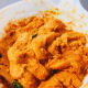 In a large bowl, combine the chicken and the paste. Add the spice mixture. Use your hand to incorporate the paste and the spice with the chicken.