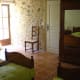 Bedroom 3 has three single beds