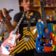 The handy-craft man with his miniture guitar
