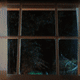 Shattering a window over a decoration that he put up at his own house.