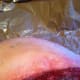 This is the fat cap and a critical part. Barbecue it fat side up so the fat renders and drips down over the meat.