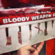 Bloody Weapon Garland is the perfect touch for your Halloween decor!