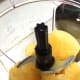 Before: Frozen orange juice in the large blender container.