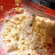 Continue mixing at a lower speed, but do not over-mix.