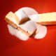 In a mixing bowl, combine the butter and sugar.