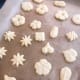 Place the cookies onto the parchment-lined baking sheet.