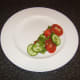 Side salad is arranged on serving plate