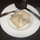 Chicken legs are removed from the poaching water