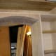 Replacing bricked Arch in doorway to kitchen with a smaller opening, and using the extra space for a built-in Larder.