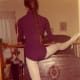 Here I am at the age of fifteen working out at the ballet barre my father made me for Christmas. I was a serious dancer, and used to practice ballet several times a week, in addition to attending ballet class.