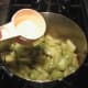 After about 4 minutes, add the water.