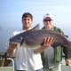 Jamie with a real good blue catfish caught on Lake Marion in South Carolina.Behind him is Gone Fishin Club member and Guide Capt.Dewayne Proffit of Takin It Easy Guide Service