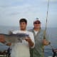 Jamie and Capt. Dewayne Proffit with a good size blue catfish caught at Santee Cooper, using cut bait.