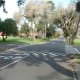 This is a crossroads in Kenridge. If you go right, you'll end up on the Tygerbergvalley Road. If you go straight, you'll end up at the Voortrekker Hall.