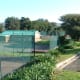 The tennis club viewed from the parking lot above.