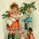 Vintage Christmas cards: little girl playing with antique toys