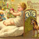 Vintage Christmas cards: Little child in bed with antique dolls