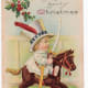Free vintage Christmas cards: little boy riding an antique rocking horse