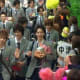The boys of Osaka Gakuen being mobbed by fans.