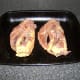 The pheasant carcasses are drizzled with olive oil, seasoned and oven roasted