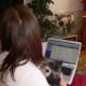 A lap is one of her most favorite places. Here she is preparing a class with Mika.