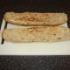 Bread stick is halved and lightly toasted