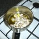 Mushrooms, garlic and seasonings are added to the heated olive oil