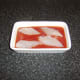 The whiting and tomato sauce is layered when assembling the fish pie