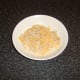 Bread and cheese are grated, seasoned and mixed