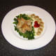 Casseroled quail on braised savoy cabbage with redcurrant jelly