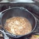 During cooking, check on the apple crisp. It will appear slightly watery, but that just means all the good stuff is simmering.