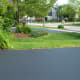 Pressure washing a driveway and sealing it can extend its life