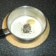 Crushed peppercorns and mustard are added to cream