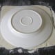 Disc is cut from rolled pastry