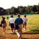 Hiking towards the equestrian venue after being dropped off by bus.