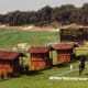 The judges were in the 3 wooden huts.
