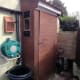 Small shed addition behind the shed to store all the garden tools