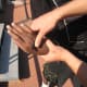 Application of a wrist lock, which can turn into a throw, using the pen as reinforcement and to put pressure on the nerves on the back of the hand.