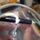 Looping the wick around the pencil as support