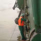 Buson and AB (able-bodied seaman) painting the aft's description of the ship (name and IMO number)